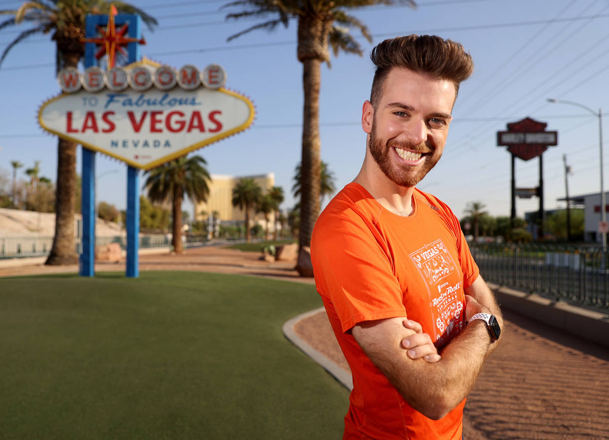 Las Vegan Ryan Romero, 26, at the Welcome to Fabulous Las Vegas sign on the Strip Friday, Aug. ...