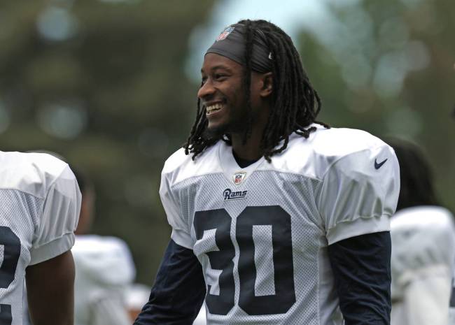 Los Angeles Rams running back Todd Gurley (30) smiles during warmup drills at a joint NFL pract ...