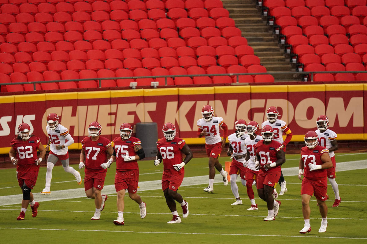 Kansas City Chiefs players run during NFL football training camp Saturday, Aug. 29, 2020, at Ar ...
