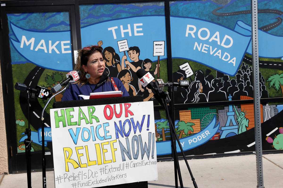 Maria Castillo, of Las Vegas, speaks at Make the Road Nevada offices before a car caravan in La ...