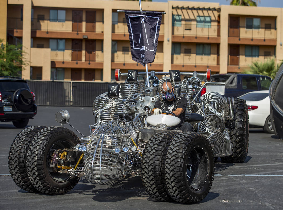 Artist Henry Chang behind the wheel of his kinetic art car Mister Fusion at his studio preparin ...