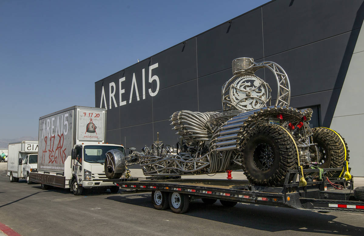 Artist Henry Chang's kinetic art car Valyrian Steel on a flatbed trailer apart of a caravan at ...