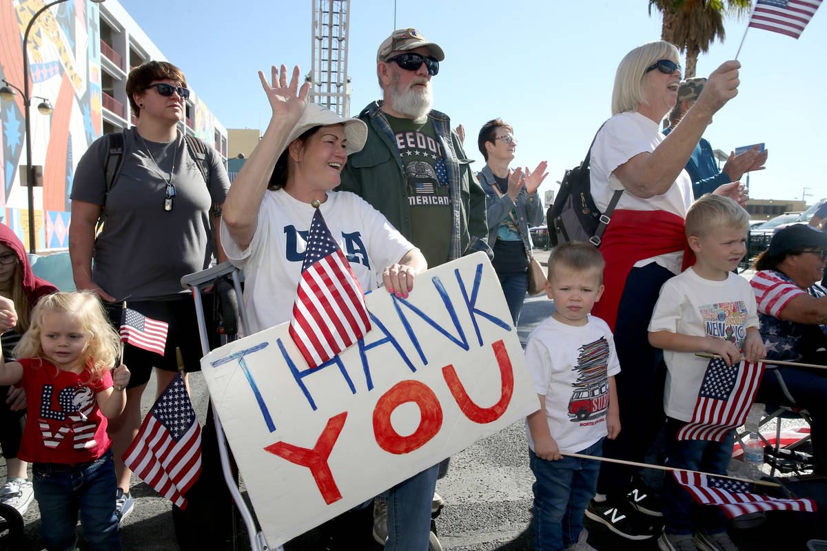 Shawn Wallice, 56, and her husband Ron Wallice, 67, of Las Vegas thanks veterans in the Veteran ...