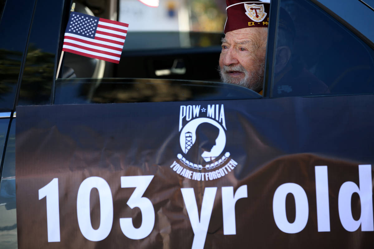 U.S. Army Air Corp veteran and Ex-POW Vince Shank, 103, in the Veterans Day Parade in downtown ...
