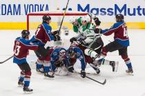 Colorado Avalanche goalie Michael Hutchinson (35) makes a save against the Dallas Stars as play ...