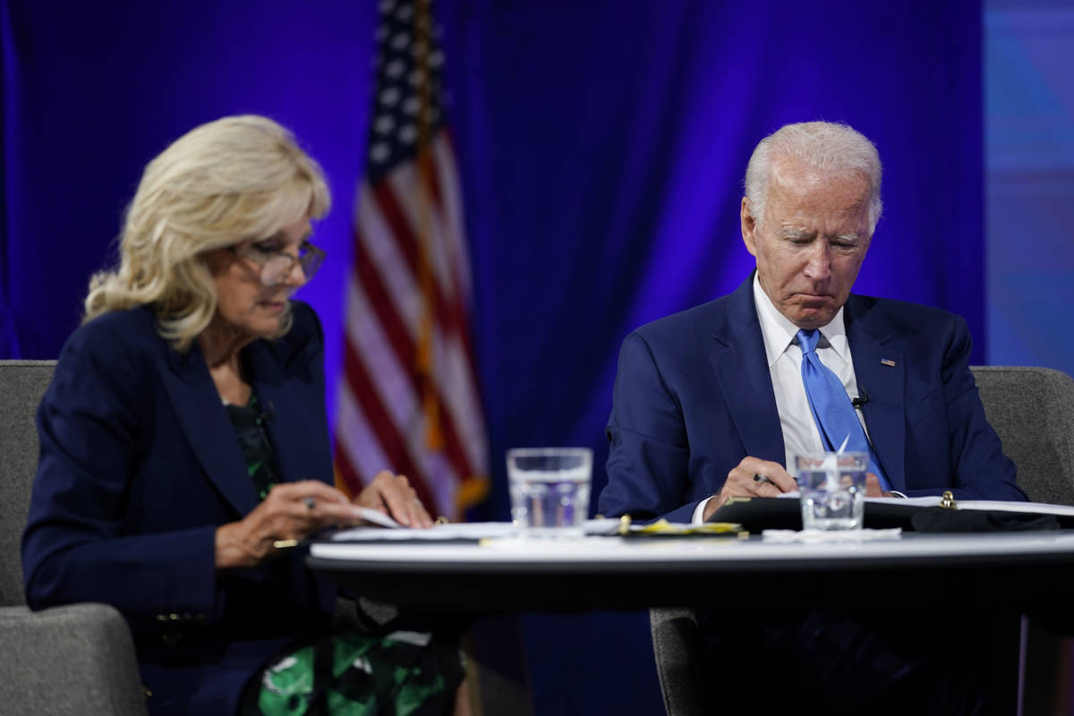 Democratic presidential candidate former Vice President Joe Biden, and his wife Jill Biden rece ...