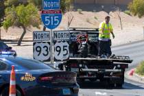 A motorcycle is being towed away as the Nevada Highway Patrol is investigating a fatal motorcyc ...