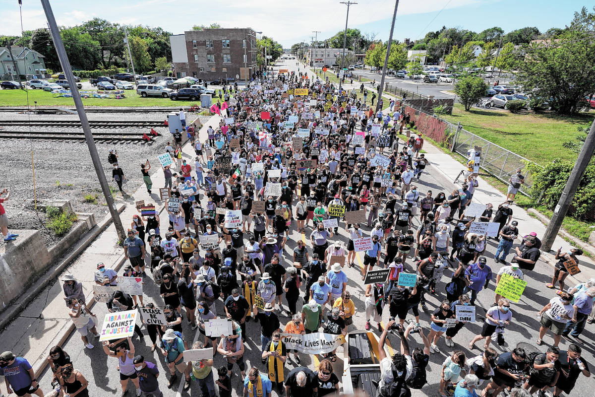 Hundreds march at a rally for Jacob Black. (AP Photo/Morry Gash)