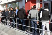 People wait in line at One-Stop Career Center on Monday, March 16, 2020, in Las Vegas. The agen ...