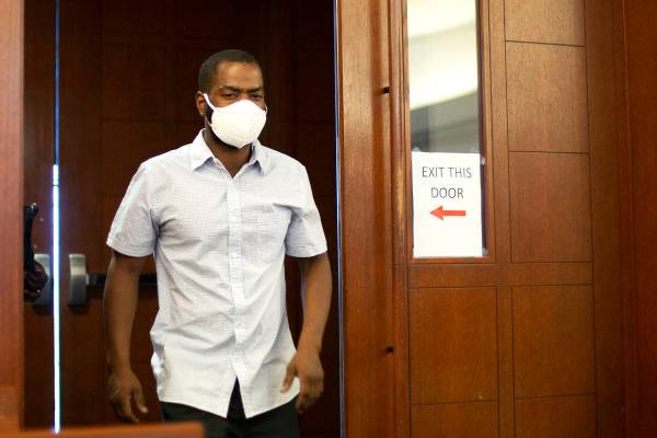 Corey Evans, a former resident of the Alpine Motel Apartments, returns to the courtroom after s ...