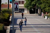 People walk on campus at San Diego State University Wednesday, Sept. 2, 2020, in San Diego. San ...