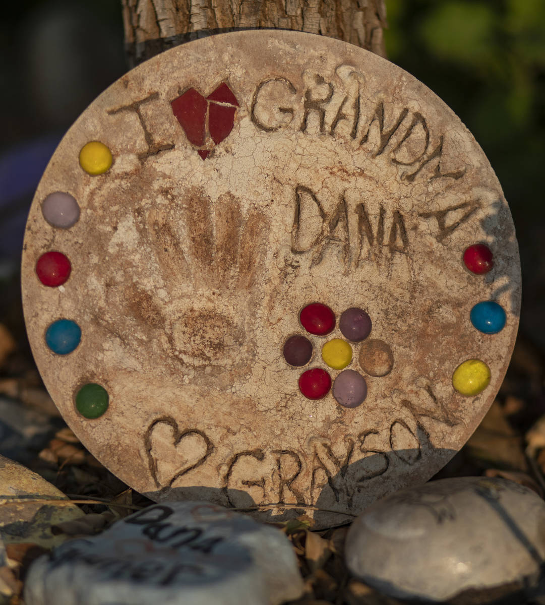Mementos adorn memorials for Route 91 Harvest festival shooting victims. (Elizabeth Page Brumle ...