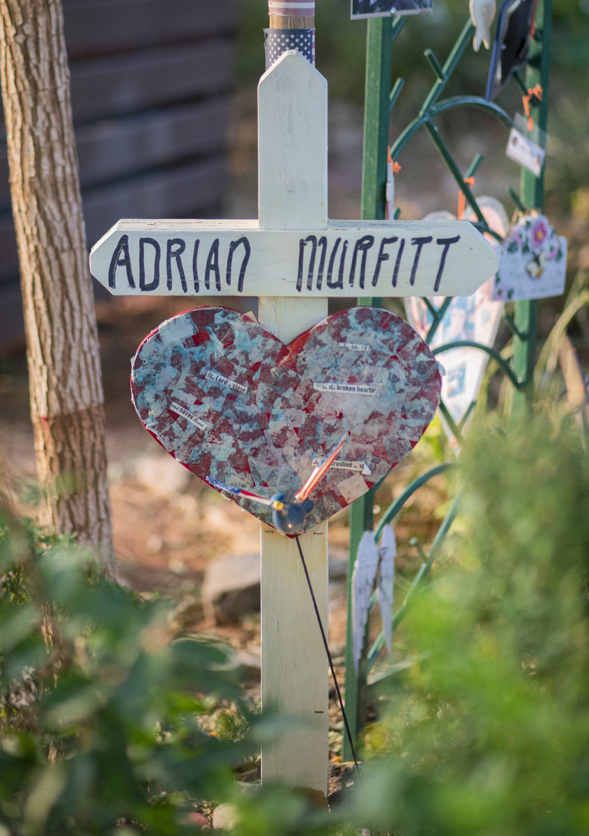 A cross stands as a memorial for Route 91 Harvest festival shooting victim Adrian Murfitt at th ...