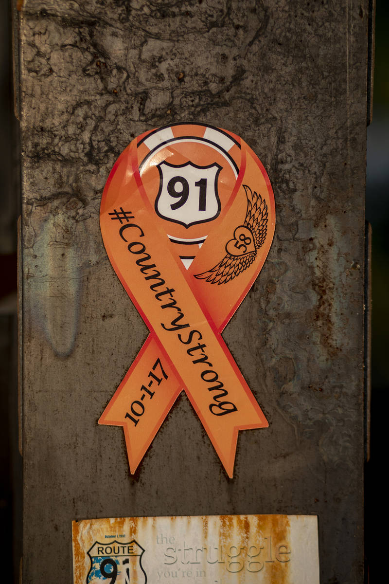 Mementos adorn memorials for Route 91 Harvest festival shooting victims. (Elizabeth Page Brumle ...