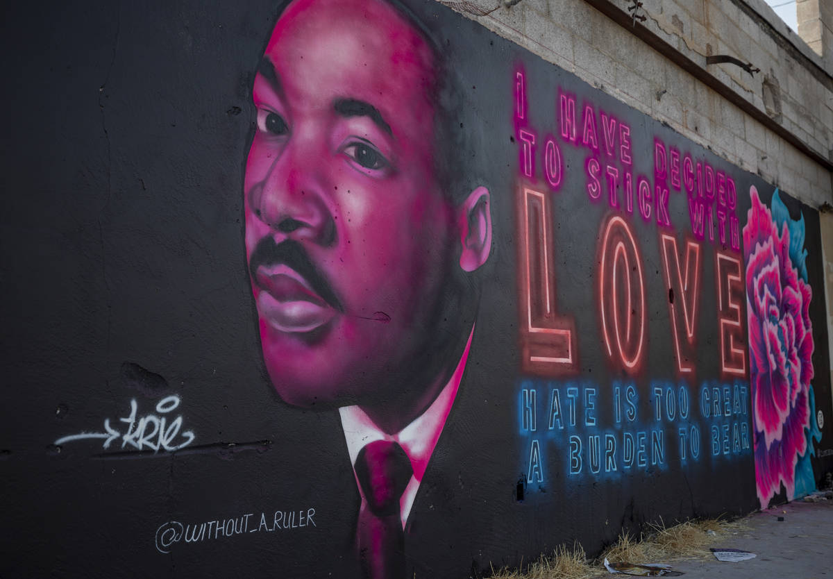 A portrait of Martin Luther King Jr. is seen painted near the Moulin Rouge by artists Krie and ...