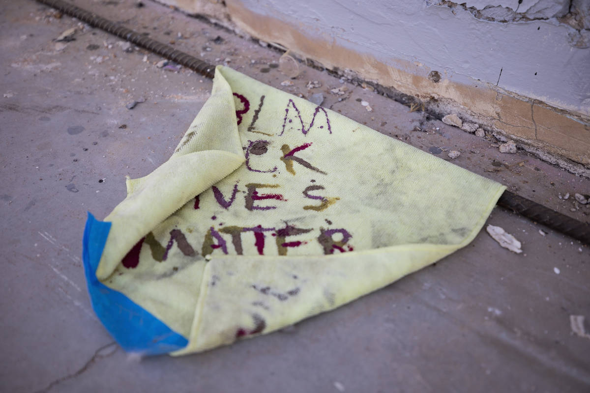 Black Lives Matter is seen painted on a towel under murals near the Moulin Rouge lot in Las Veg ...