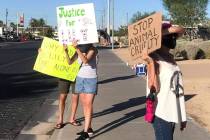 Protesters were in front of North Las Vegas City Hall on Wednesday to ask for felony charges ag ...