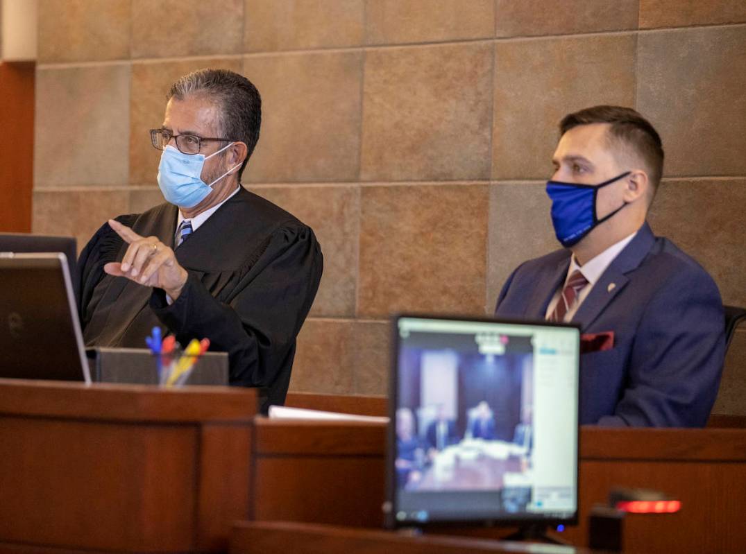 Judge Michael Villani, left, addresses attorneys during a sentencing hearing for Scott Gragson, ...