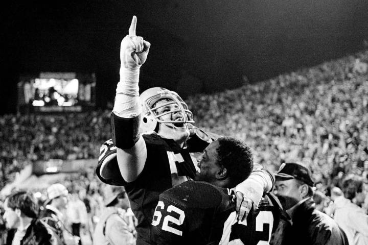 In this Jan. 23, 1984, file photo, Los Angeles Raiders' Matt Millen gestures as he celebrates w ...