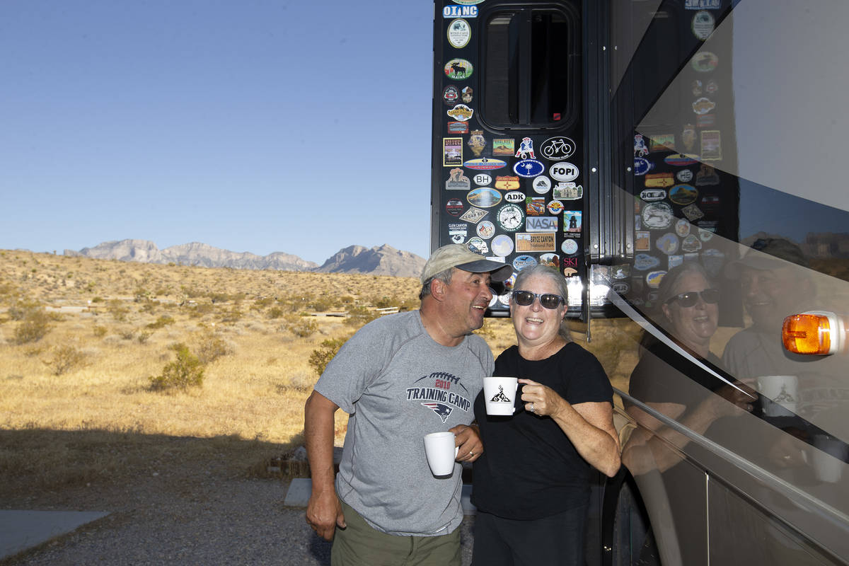 Louis DeSantis and Diane DeSantis, of Massachusetts, enjoy a cup of coffee during their cross-c ...