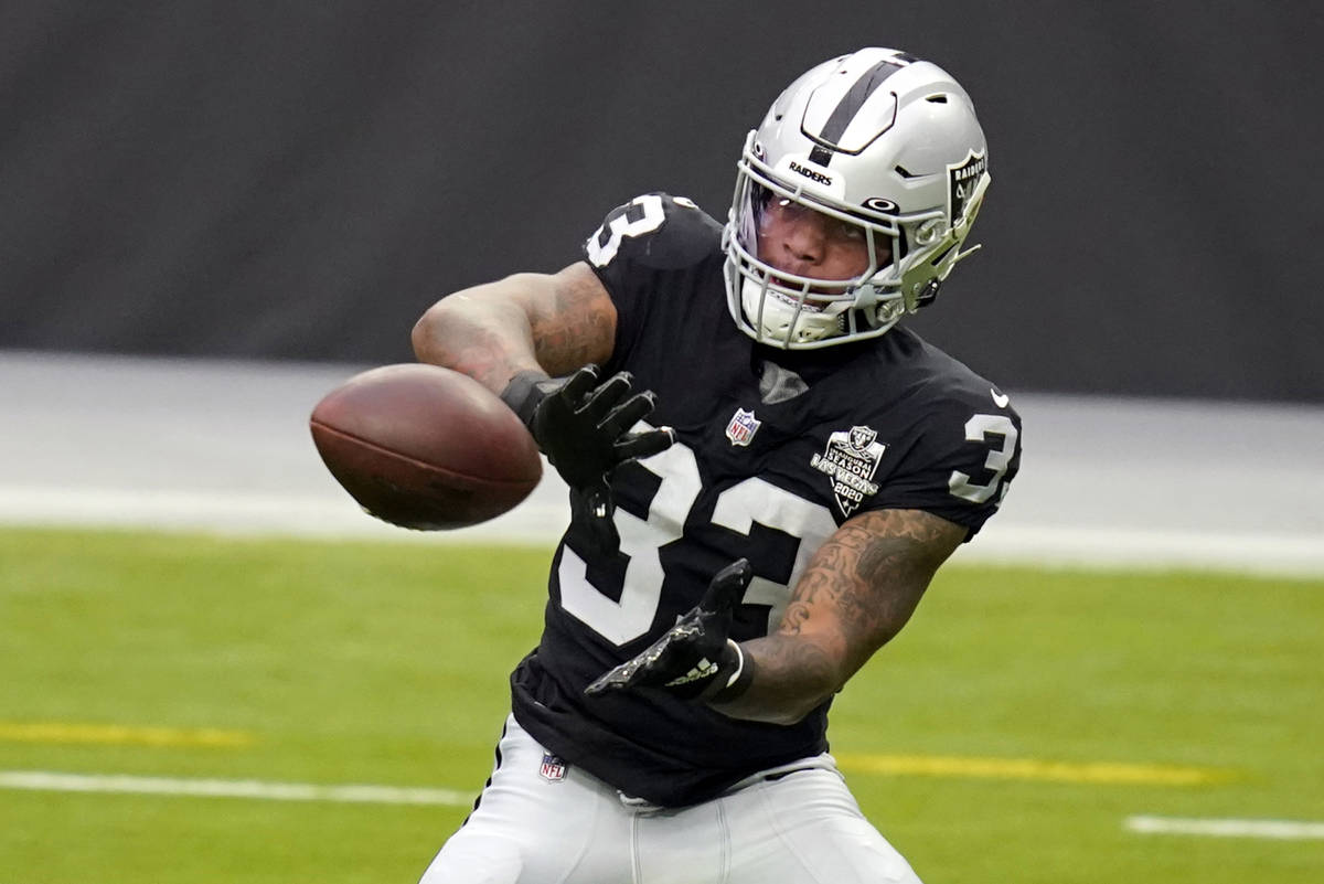 FILE - In this Friday, Aug. 28, 2020, file photo, Las Vegas Raiders running back Lynn Bowden Jr ...