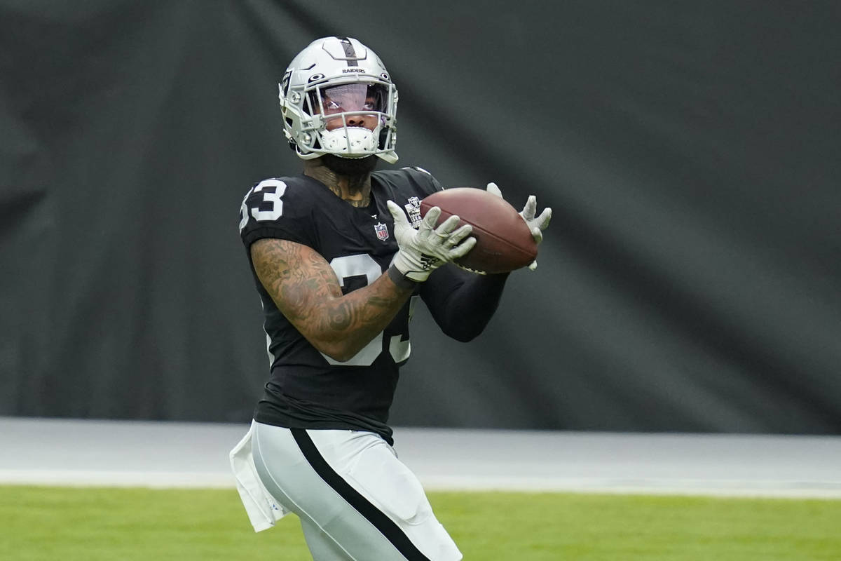 Las Vegas Raiders running back Lynn Bowden Jr. (33) catches a ball during an NFL football train ...