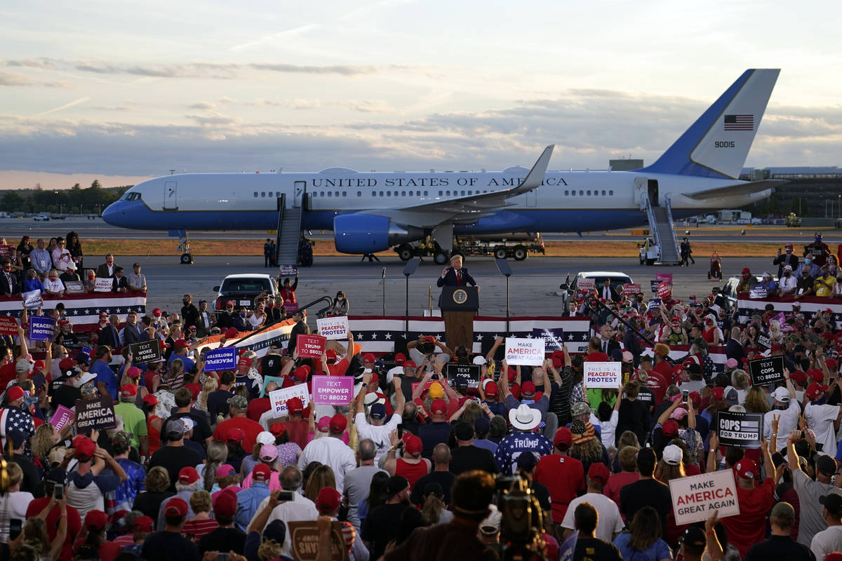 President Donald Trump speaks during a campaign rally at Manchester-Boston Regional Airport, Fr ...