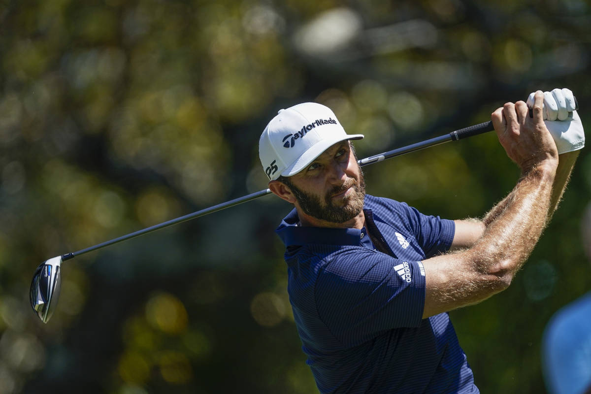 Dustin Johnson hits his tee shot on the fifth hole during the final round of the Tour Champions ...