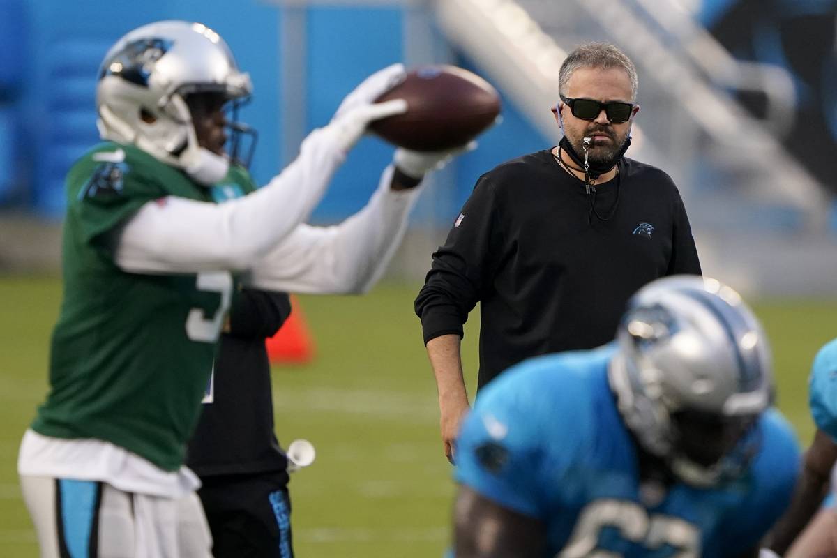 Carolina Panthers head coach Matt Rhule watches during an NFL football camp practice Wednesday, ...