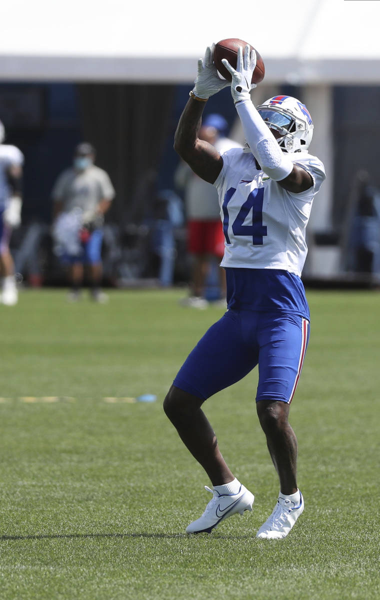 Buffalo Bills wide receiver Stefon Diggs (14) catches a pass during an NFL football training ca ...