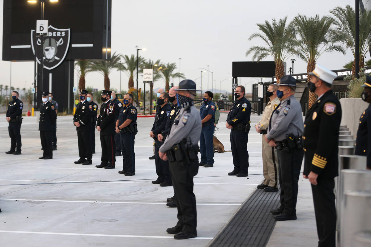 Multi-agency emergency responders participate during a 9/11 ceremony at Allegiant Stadium in La ...