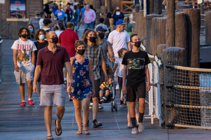 This August 7, 2020, file photo shows visitors on the Las Vegas Strip. (L.E. Baskow/Las Vegas R ...