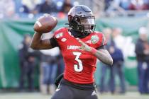 Louisville quarterback Micale Cunningham (3) plays against Mississippi State in the Music City ...