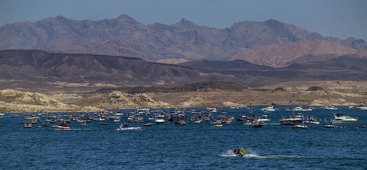 A mass of boats move along the lake during the President Donald Trump boat parade on Lake Mead ...