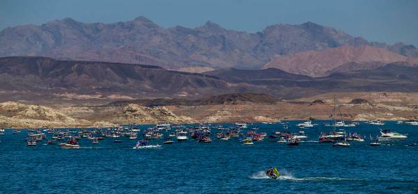 A mass of boats move along the lake during the President Donald Trump boat parade on Lake Mead ...