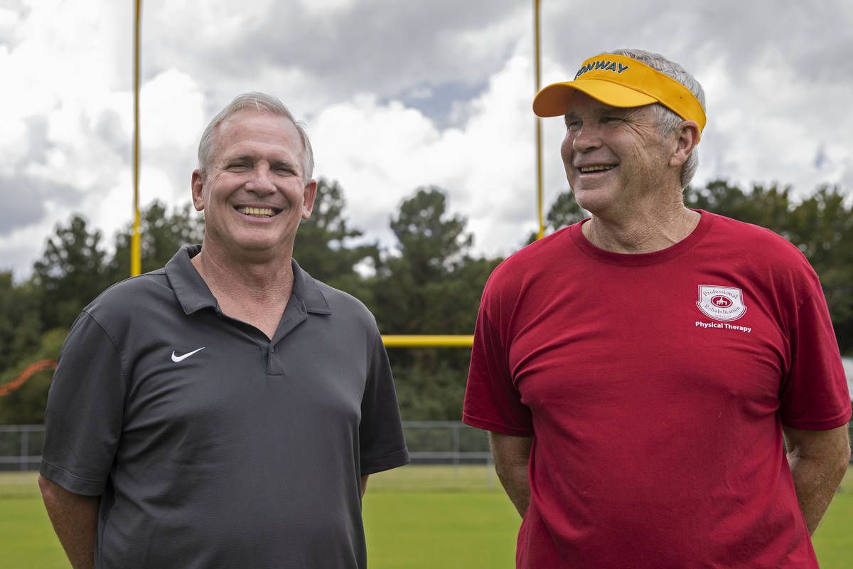 Tim Renfrow, left, father of Raiders wide receiver Hunter Renfrow, and Chuck Jordan, former hig ...