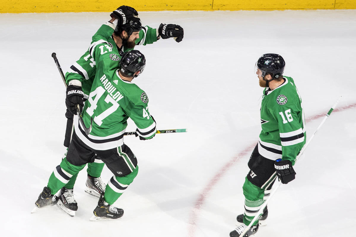 Dallas Stars' Jamie Benn (14) celebrates his goal against the Vegas Golden Knights with teammat ...