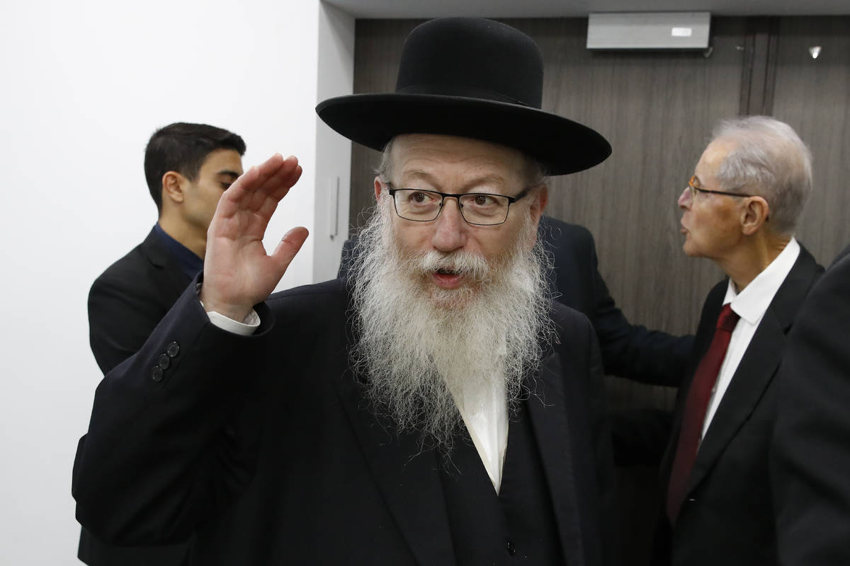 FILE - In this Feb. 23, 2020 file photo, Israeli Health Minister Yaakov Litzman arrives for a s ...