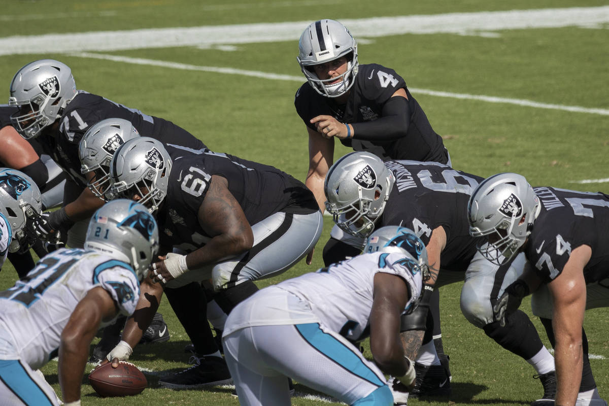 Las Vegas Raiders quarterback Derek Carr (4) calls an audible during the second half of an NFL ...