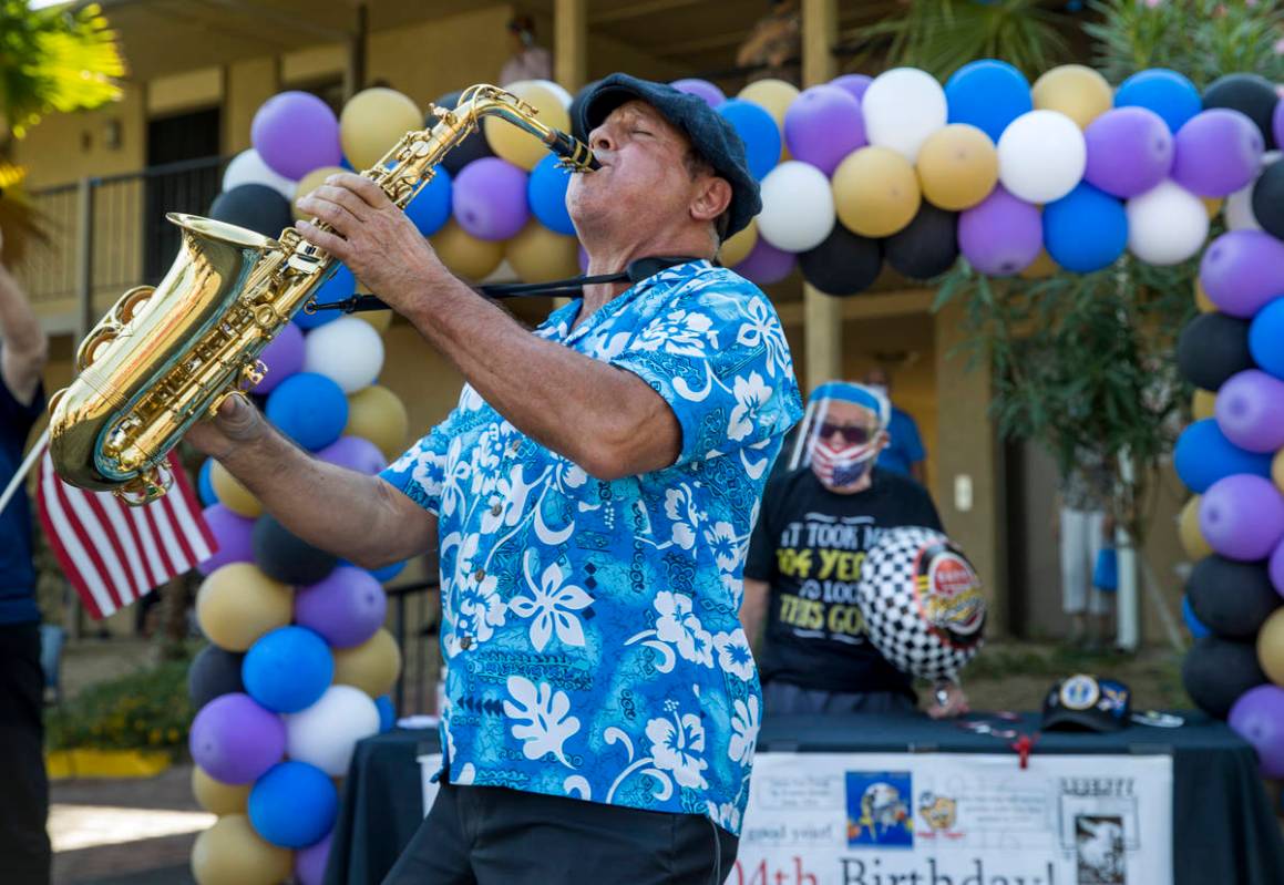 Martin Mancuso plays the sax during the celebration for Vincent Shank, a World War II veteran a ...