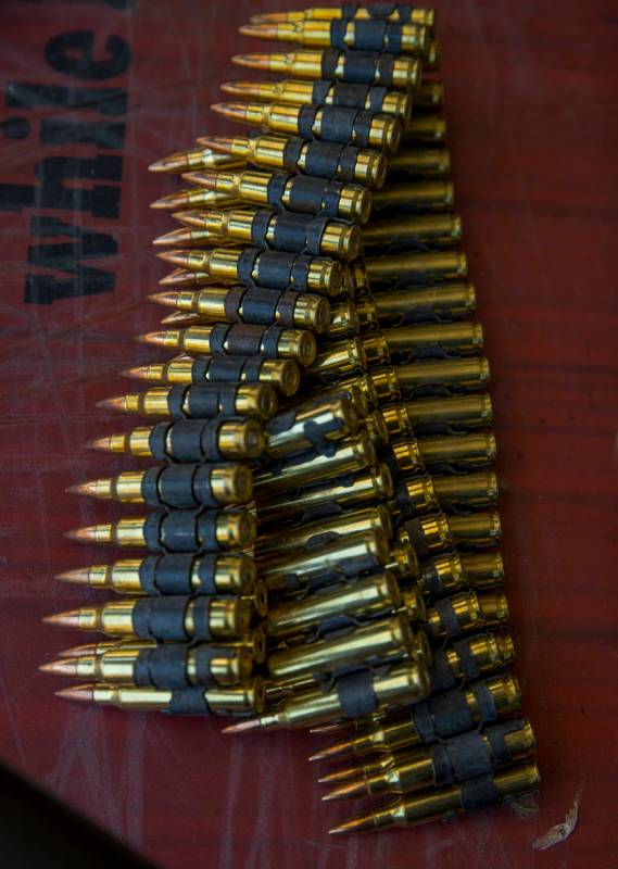 A bandolier of ammunition is ready for firing on the Adrenaline Mountain gun range, Thursday, S ...