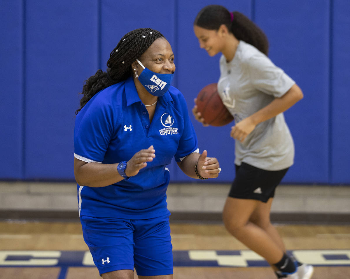 Dorothy Kendrick, left, head women's basketball coach at the College of Southern Nevada, works ...