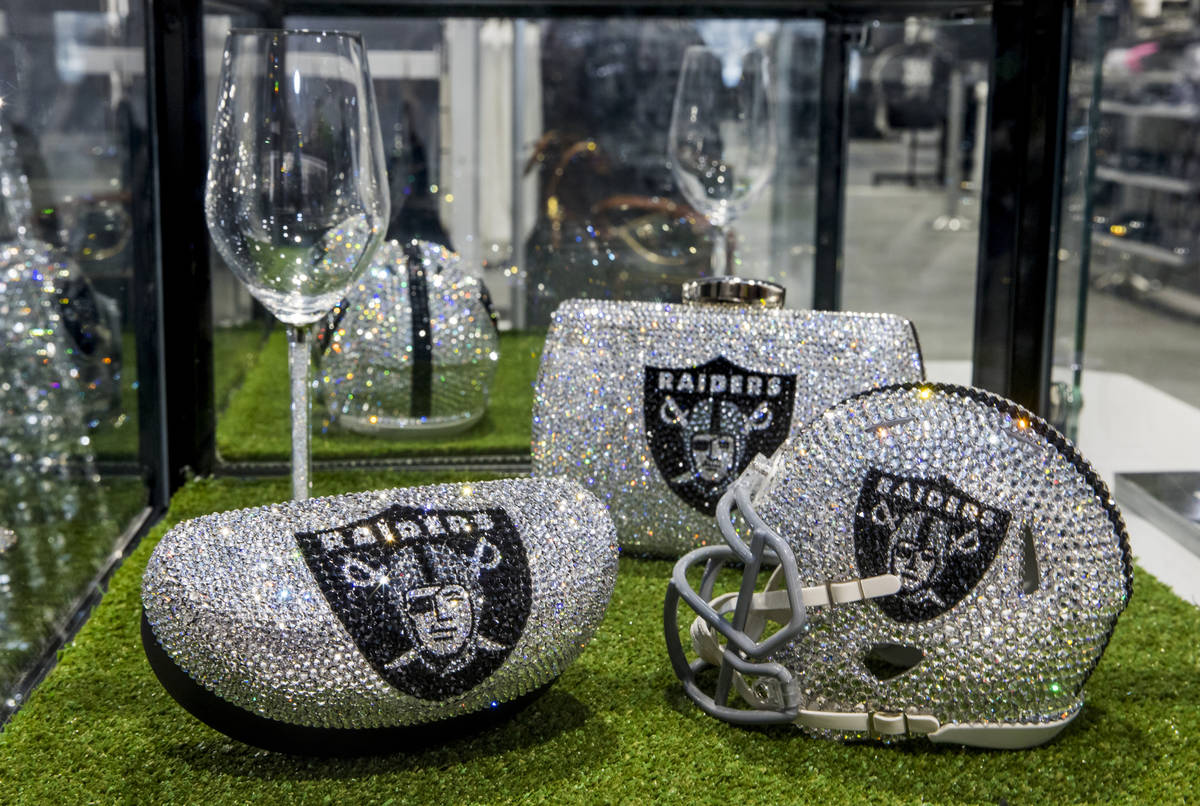 Crystal covered merchandise can be purchased at The Raider Image official team store inside of ...
