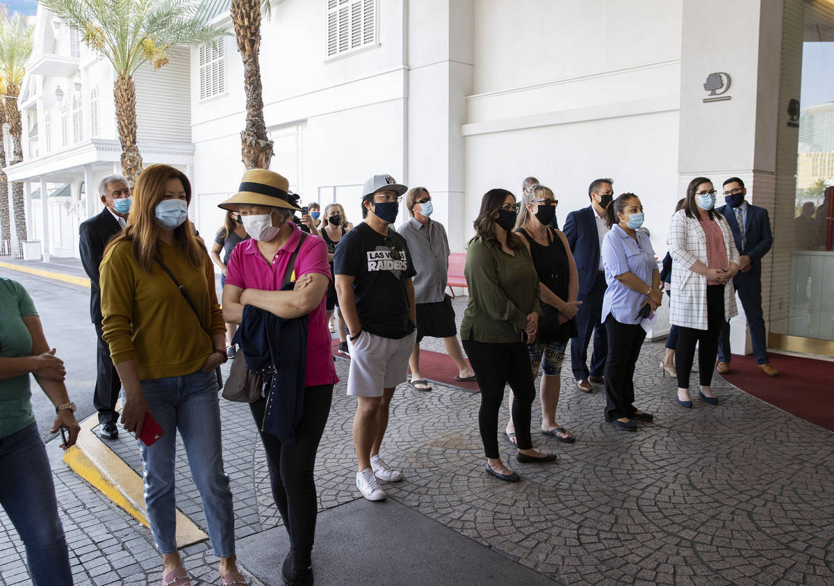 Gusts and employees wait as the Tropicana hotel-casino reopens to public, on Thursday, Sept. 17 ...