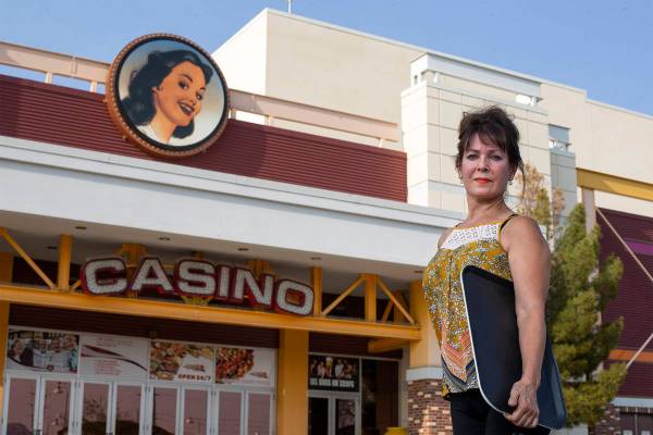 Sharon Beza, a former employee of Eastside Cannery hotel-casino, poses for a portrait outside h ...