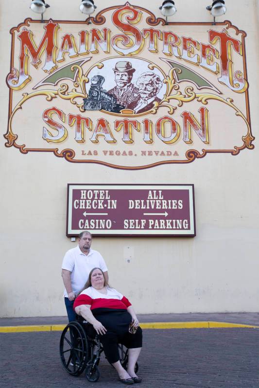 Married couple Jeff Gove and Lori Gove pose for a portrait outside Main Street Station on Thurs ...