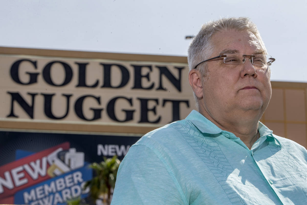 Keith Brooks poses for a portrait outside his former workplace of six years, Golden Nugget Laug ...