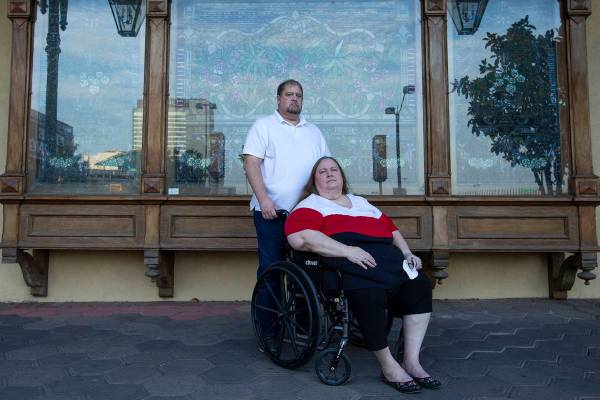 Married couple Jeff Gove and Lori Gove pose for a portrait outside Main Street Station on Thurs ...