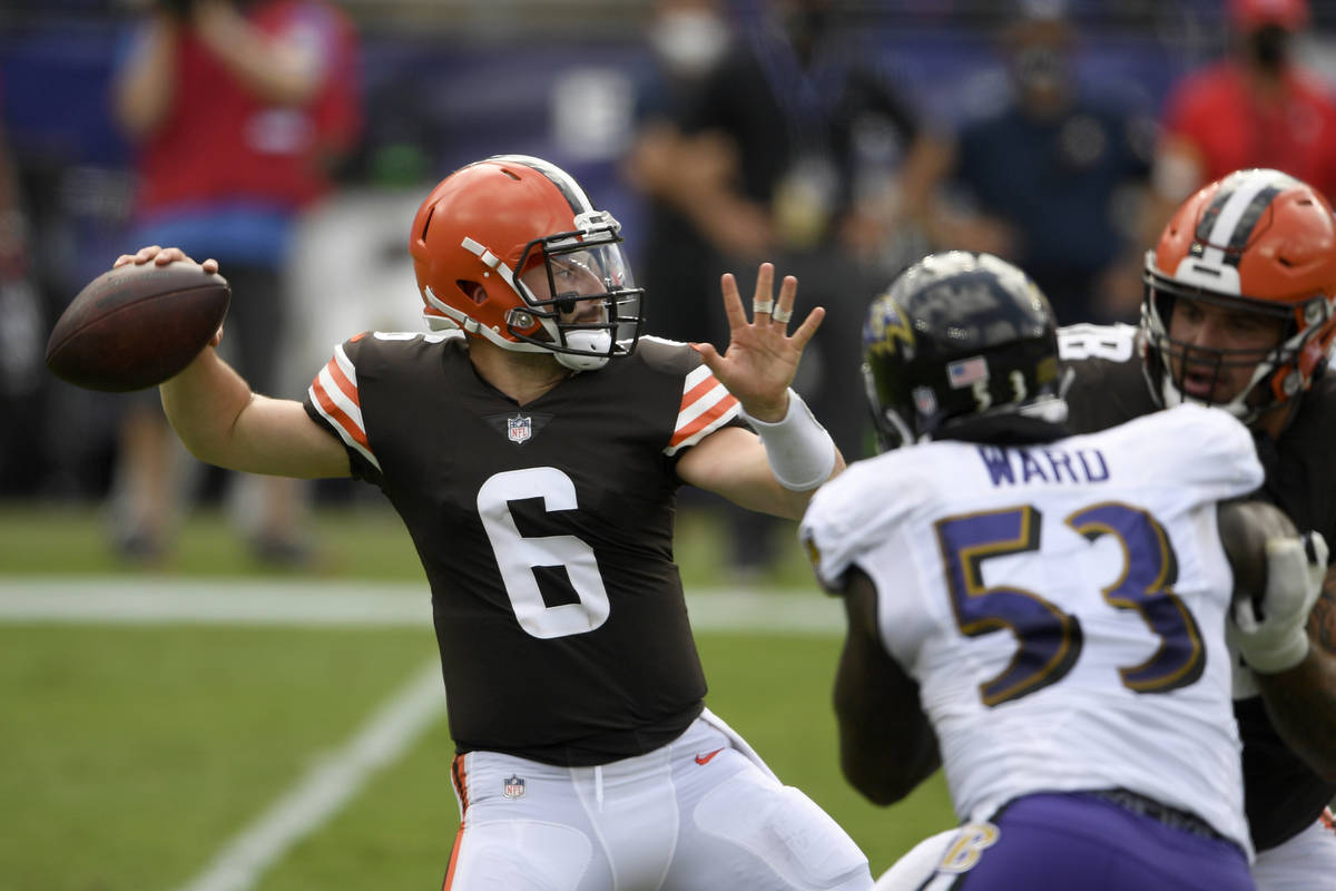 FILE - Cleveland Browns quarterback Baker Mayfield (6) looks to pass during an NFL football gam ...