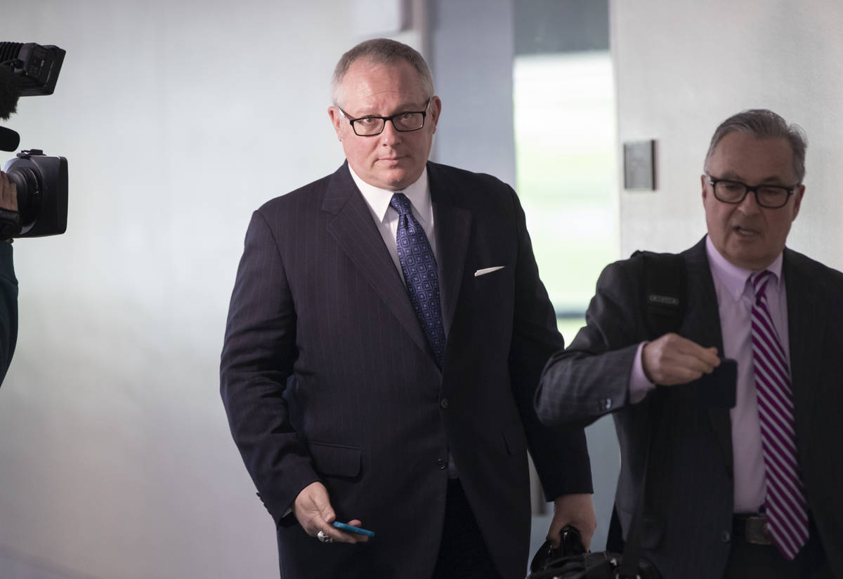 FILE - In this May 1, 2018, file photo, Former Donald Trump campaign official Michael Caputo, l ...